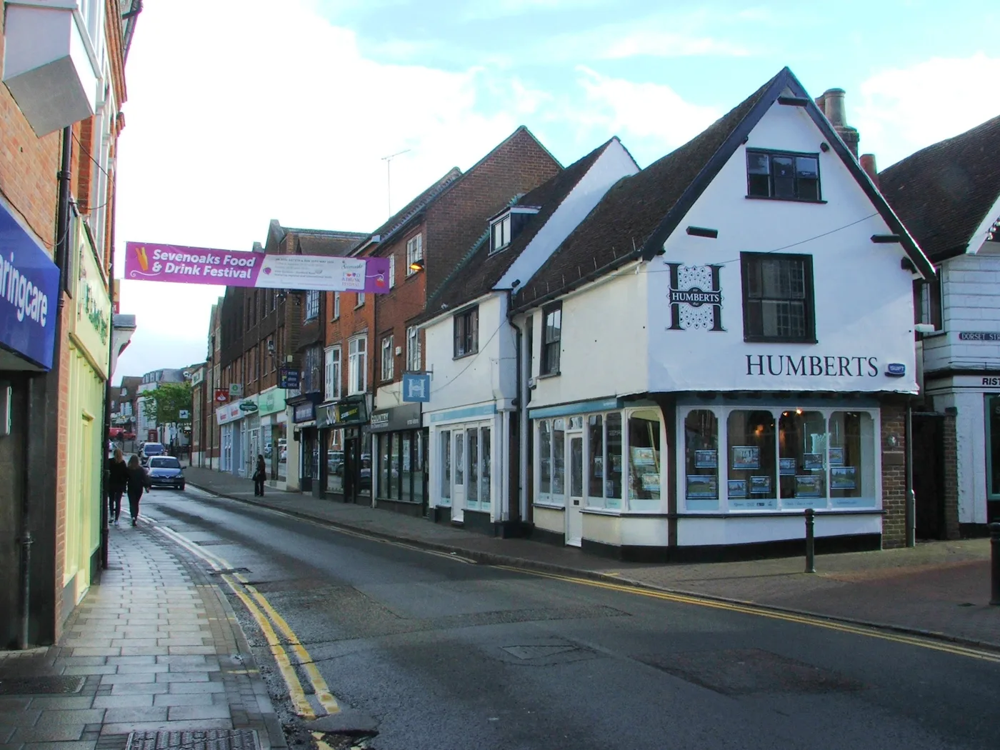 Sevenoaks High Street at the Dorset Street corner, a minute from several of the cafés in this guide.